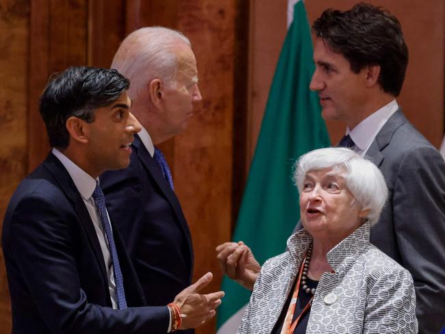 Britain's Prime Minister Rishi Sunak (L) speaks with US Treasury Secretary Janet Yellen (2R) as US President Joe Biden (2L) speaks with Canada's Prime Minister Justin Trudeau before the start of the second working session meeting at the G20 Leaders' Summit at Bharat Mandapam in New Delhi on September 9, 2023. (Photo by Ludovic MARIN / POOL / AFP)