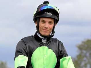 WINNERS: Jockey Boris Thornton returns to the scale after riding Reckless Choice to victory in a race at Ipswich. They won again at Corbould Park on Saturday. Picture: DAVID CLARK