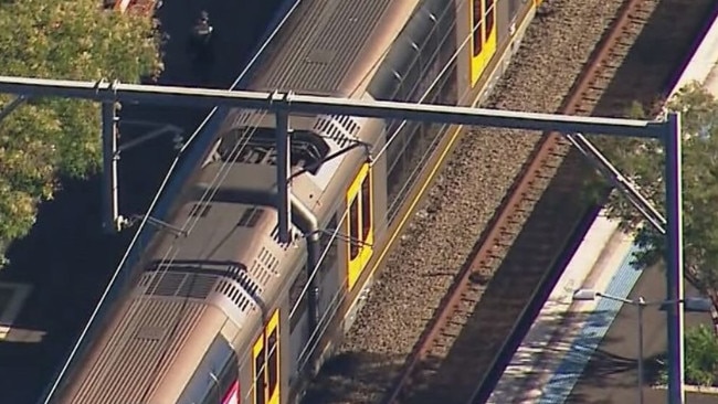 The pram rolled onto the tracks. Picture: 7News