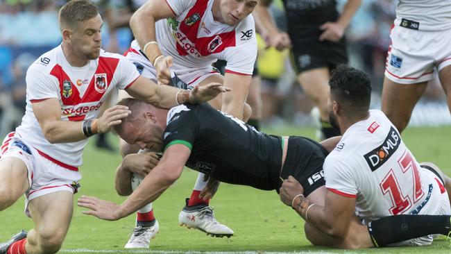 Hull FC’s Liam Watts gets one for the visitors.
