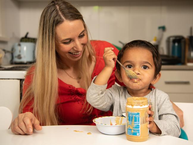 2 year old Ezekiel Sanmuganathan photographed eating peanut butter with his mum Greta Sanmuganathan at home in Bronte on Tuesday, 28 April 2020,( Image / Monique Harmer)