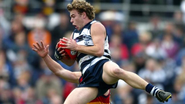 David Clarke as a high-flying Geelong wingman in 2002.