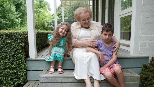 Mira pictured with her grandchildren.