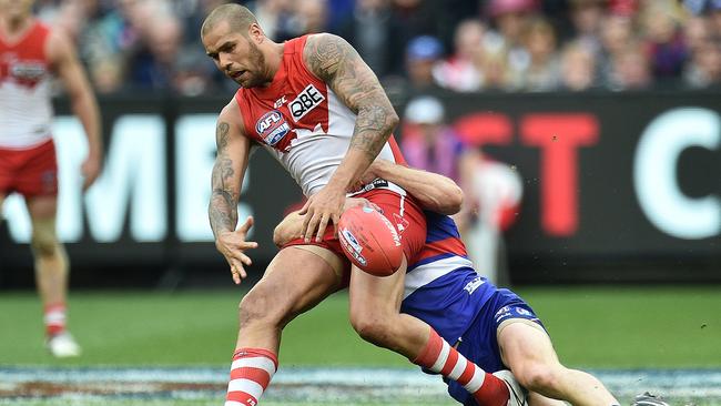 Lance Franklin would still have nightmares of this tackle from Dale Morries in the 2016 Grand Final. Picture: AAP