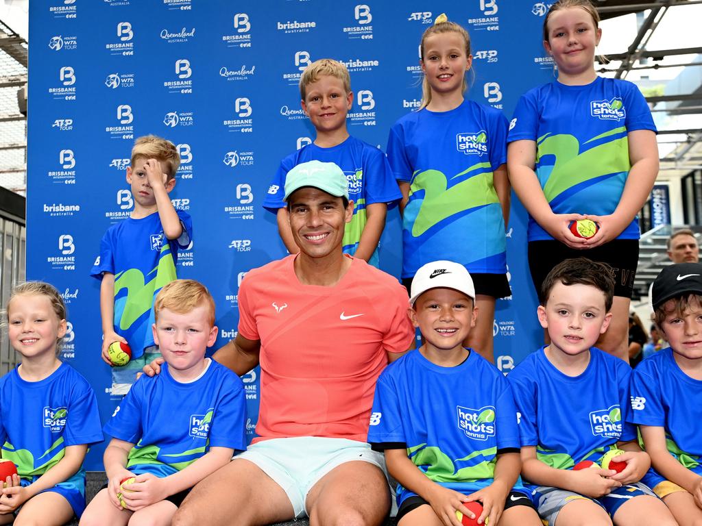 Rafael Nadal with junior tennis players at the Queen Street Mall. Picture: Bradley Kanaris/Getty Images