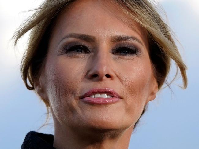 US First Lady Melania Trump speaks before boarding Air Force One at Joint Base Andrews in Maryland on January 20, 2021. - US President Donald Trump travels to his Mar-a-Lago golf club residence in Palm Beach, Florida, and will not attend the inauguration for President-elect Joe Biden. (Photo by ALEX EDELMAN / AFP)