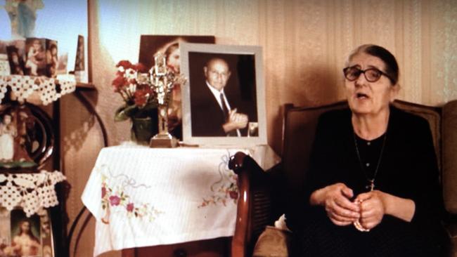 Jamilie Joseph in her home with a photo of her late husband Tony. Picture: YouTube/Widows of Parramatta