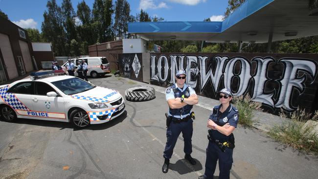 Police at the Lone Wolf Bikie club house in Currumbin. Constable Leigh Coulter and Constable Belinda Peacock. Photo Scott Fletcher