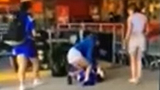 Disturbing footage of a Redcliffe schoolgirl striking another student in the head at a supermarket has emerged online. Picture: Supplied