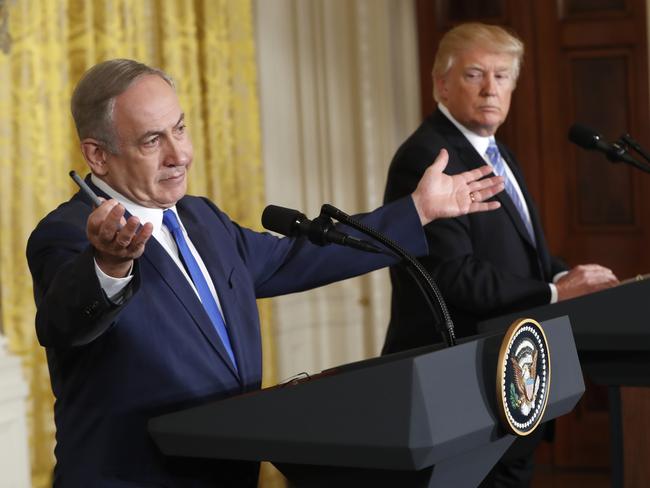 FILE - In this Wednesday, Feb. 15, 2017 file photo, President Donald Trump and Israeli Prime Minister Benjamin Netanyahu give a joint news conference in the East Room of the White House in Washington. The debate among American Jews over President Donald Trump has become as raucous as the first weeks of the Trump administration itself, hardening divisions between liberal and conservative Jews that have been growing for years. (AP Photo/Pablo Martinez Monsivais)