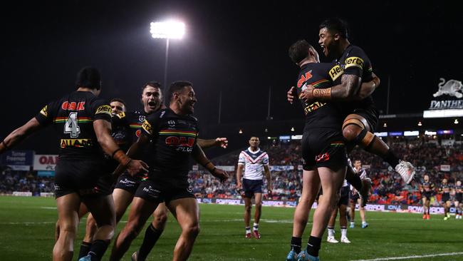 The Panthers celebrate a Brian To'o try against the Roosters. Picture: Jason McCawley/Getty Images