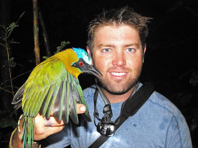 Holding a Mot Mot bird in Ecuador.