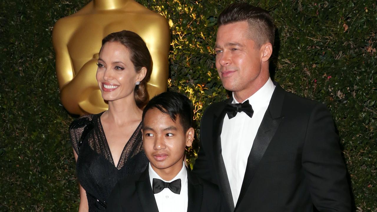 Jolie, Pitt and their eldest son, Maddox. Picture: Frederick M. Brown/Getty Images