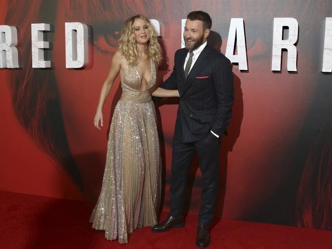 J-Law with co-star and rumoured love interest Joel Edgerton at the Red Sparrow London premiere. Picture: AP