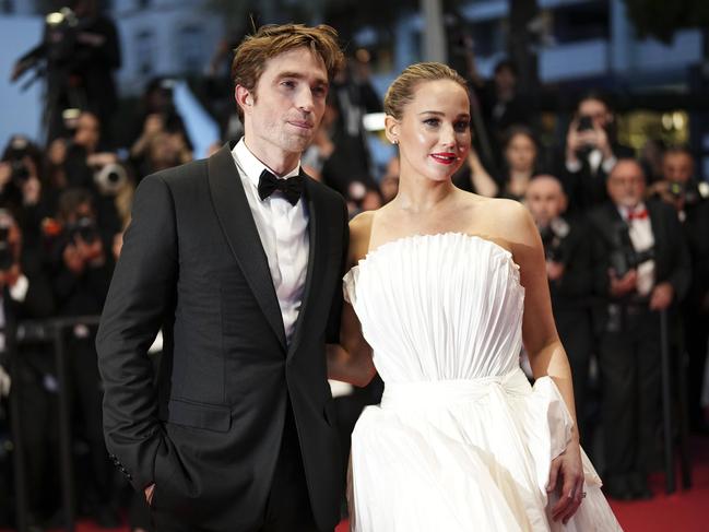 Robert Pattinson and Jennifer Lawrence pose at the premiere of their new film, Die, My Love, at Cannes Film Festival. Picture: Scott A Garfitt/Invision/AP
