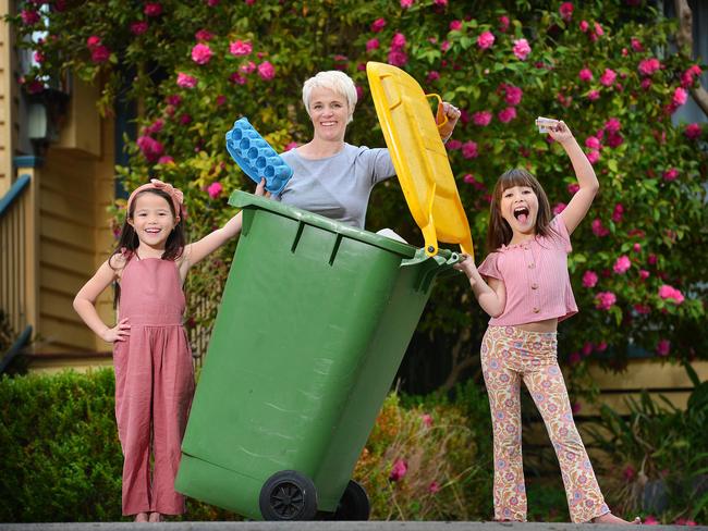 Kristy Bautista and her children Mila, 9, and Evie, 7, gives her daughters $2 for emptying the dishwasher and more for helping with other chores. Picture: Nicki Connolly