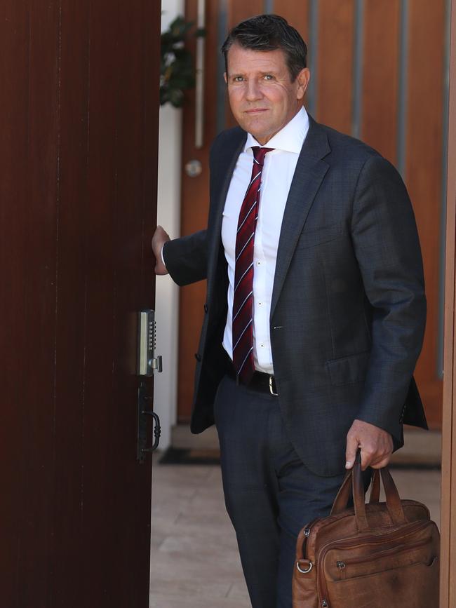 Mike Baird leaves his home bound for the ICAC hearings on Wednesday.