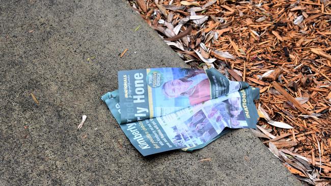 How-to-vote pamphlets for Nationals hopeful Kimberley Hone left out in the rain. Picture: Tessa Flemming