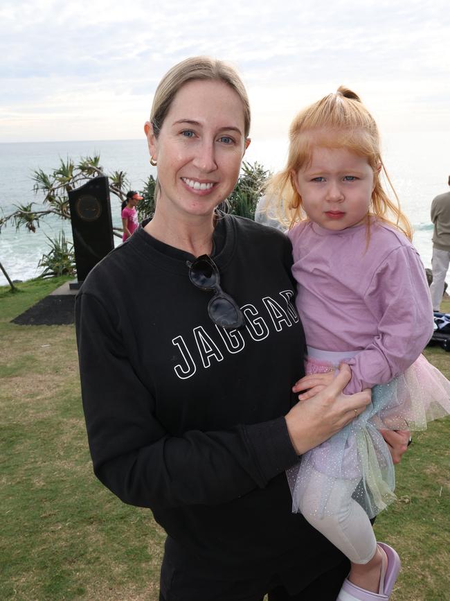 Jaimie and two-year-old Kirby Doe at the Surf of Origin at Burleigh Beach. Picture: Annette Dew