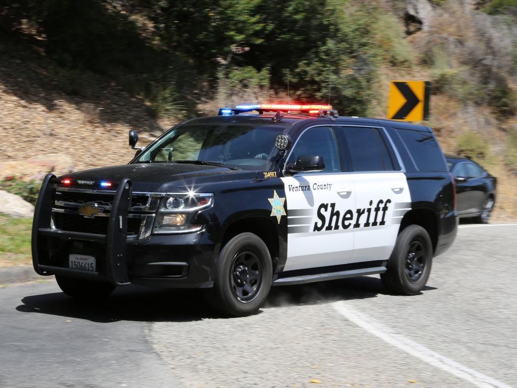 Police arrive at Britney Spears’ home. Picture: Backgrid