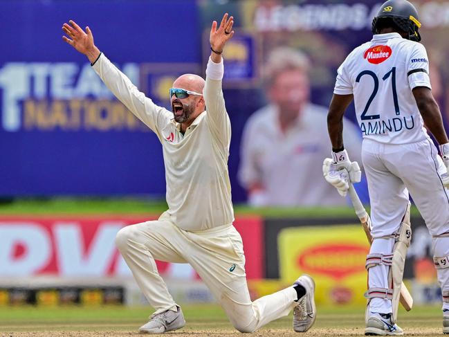 Nathan Lyon successfully appeals for leg before wicket against Sri Lanka's Angelo Mathews Picture: AFP