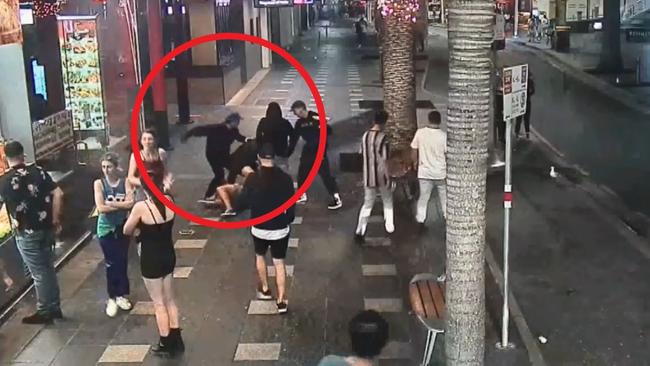 Ivan Susin, 29, can be seen throwing a punch after intervening, before he is knocked out cold. Gold Coast Surfers Paradise fight assault. Lefoe is wearing a black hoodie.