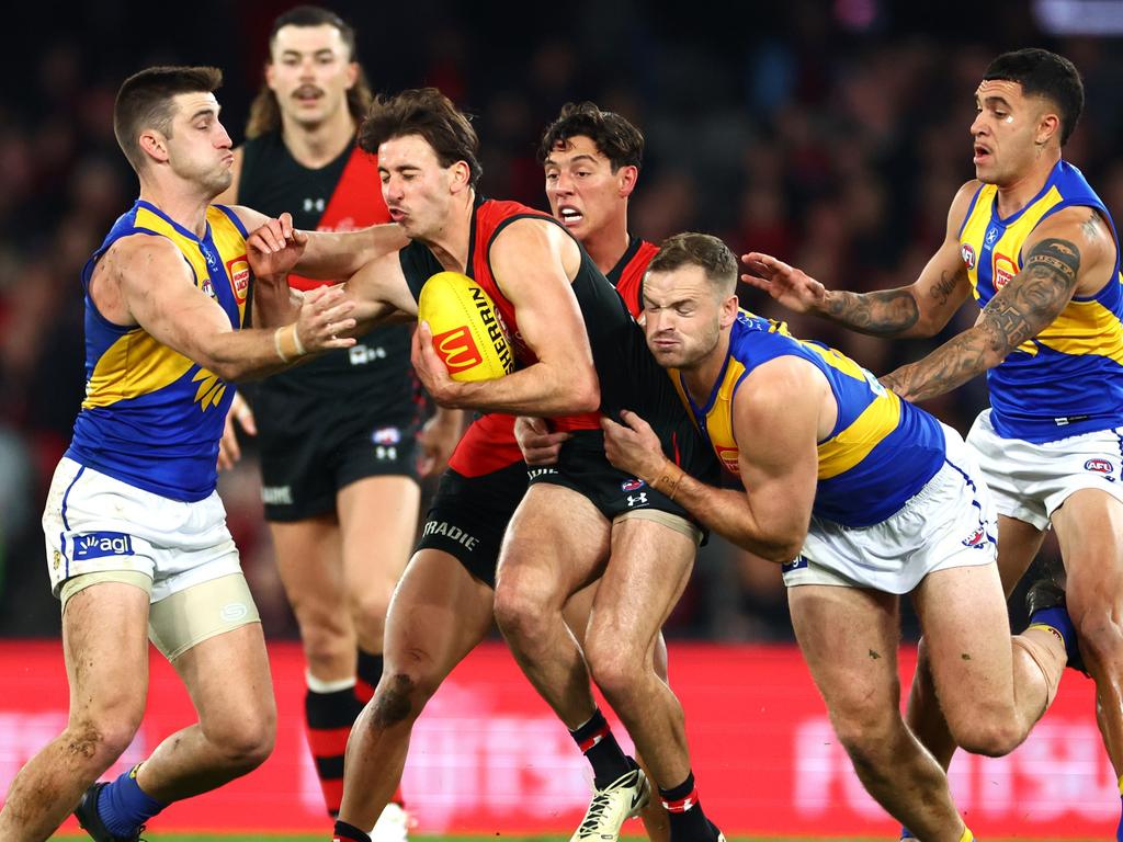 Nic Martin is tackled by Elliot Yeo and Matt Flynn. Picture: Quinn Rooney/Getty Images