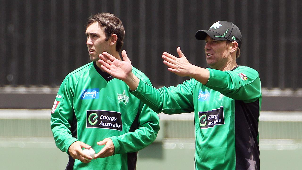 Shane Warne directs teammate Glenn Maxwell in practice match in 2012.