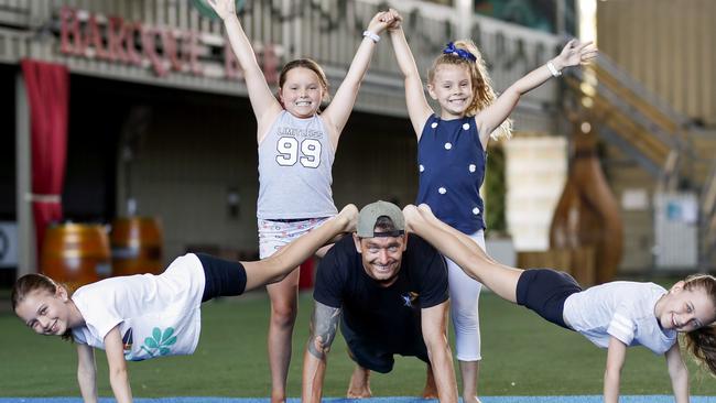 Ella Lindeberg, 8, Milli Mansbridge, 8,Instructor, Neal Webb, Billie Frampton, 7, and Sophie Lindeberg, 8, showing off their acrobat tricks. Photo: Tim Marsden