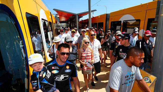 Fans pour out of the G: Link trams on their way to the Gold Coast 600. Picture: David Clark