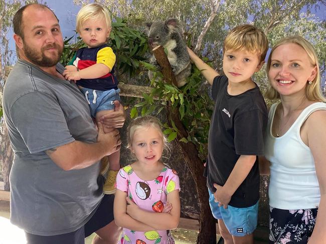 Olivia Stevens, 6, with her parents Scott and Yana and her two brothers earlier this year.