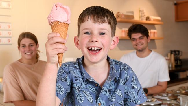 Number 7: Charlie, 7, with Bella Moss and Liam Chase, who work at Okay Lucy. Picture: Penny Stephens