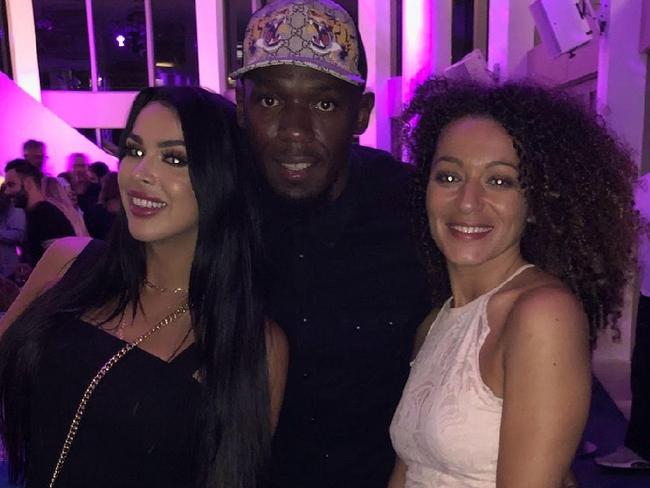 Raquel Petit and Usain Bolt with another club-goer on a night out at a Gold Coast hotspot. Photo: Supplied