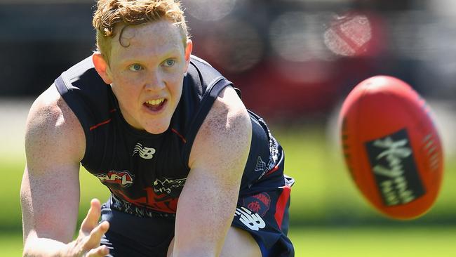 Young bull ... Clayton Oliver of the Demons marks at training Picture: Quinn Rooney (Getty Images)