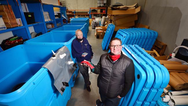 FloatPac owner John Curtain, left, and chief executive Gavin Hodgins have started making face masks while the rest of business activities take a hit during coronavirus. Picture: Nicki Connolly