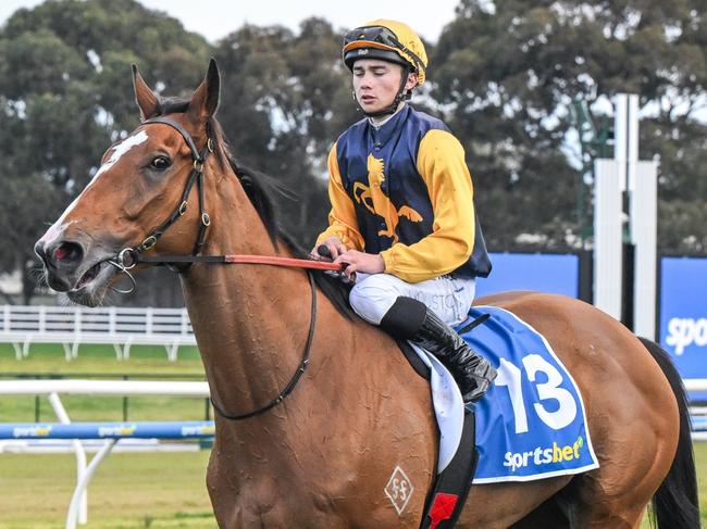 Ryan Houston returns to the mounting yard on British Columbia after winning the Sportsbet Same Race Multi Handicap at Caulfield Racecourse on July 13, 2024 in Caulfield, Australia. (Photo by Reg Ryan/Racing Photos via Getty Images)