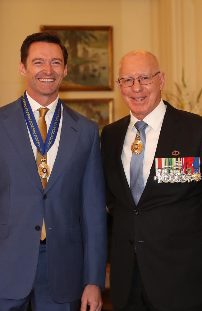 Hugh Jackman being appointed a Companion in the General Division by the Governor-general David Hurley, during investiture ceremony at Government House in Canberra. Picture: Kym Smith