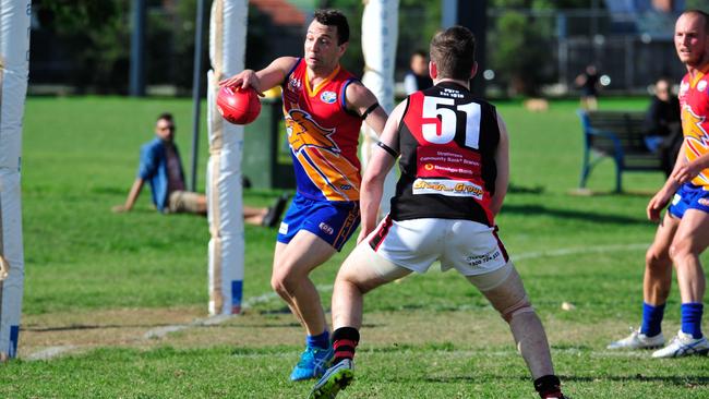 Robbie Castello gets a kick away during his days with Maribyrnong Park. Picture: Jamie Morey