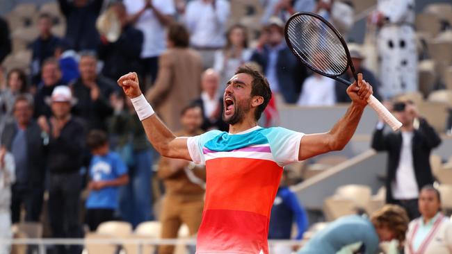 Marin Cilic celebrates match point against Andrey Rublev. Picture: Getty