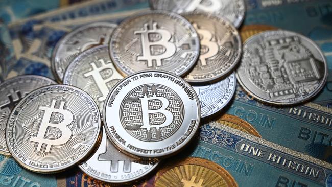 Many people have lost money betting on cryptocurrency. (Photo by Ozan KOSE / AFP)