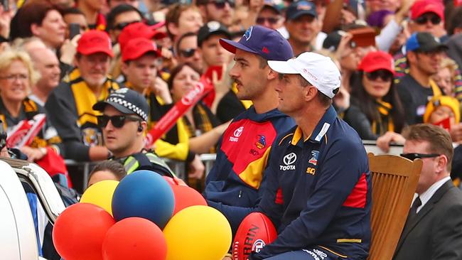 Crows captain Taylor Walker and coach Don Pyke take in the Grand Final Parade on Friday. Picture: Scott Barbour/Getty Images