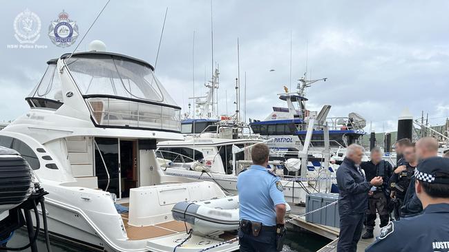 Police during the operation on Friday morning at the Mid-North Coast town of South West Rocks, near Nambucca Heads. Supplied by NSW Police.