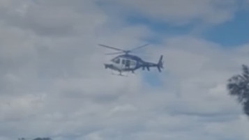 Helicopters were deployed near Shearer Park in Lansvale. Picture: 7 News