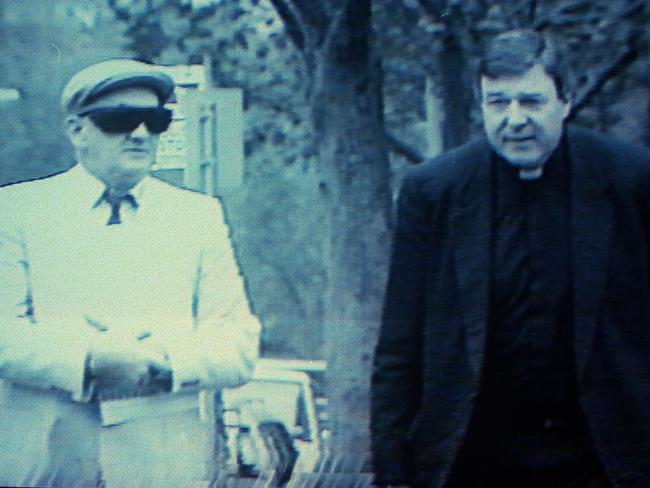 Pell walked said he was offering support when he walked alongside convicted paedophile priest Gerald Ridsdale. Picture: Channel 9