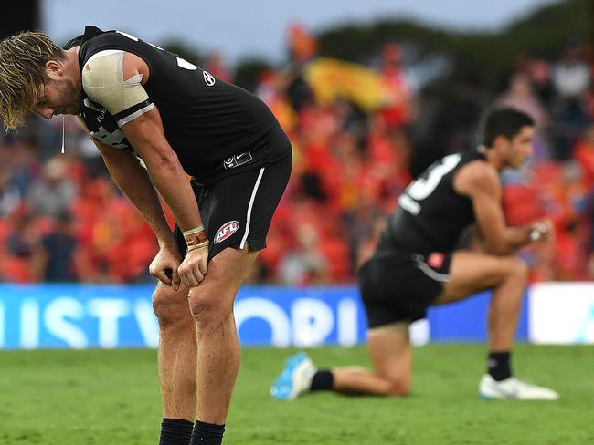 Dale Thomas of the Blues is dejected after Jack Bowes of the Suns kicked the winning goal during the Round 4 AFL match between the Gold Coast Suns and the Carlton Blues at Metricon Stadium on the Gold Coast, Sunday, April 14, 2019. (AAP Image/Dave Hunt) NO ARCHIVING, EDITORIAL USE ONLY