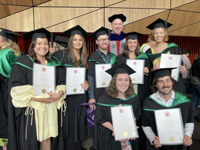 Ivy Kennedy, Givelia Costanzo, Mia Rober-Ewing, Chris Tormey, Joshua Taylor, Neve Stiller and Elly Blakeley graduated from Australian Catholic University with a Master's of Teaching (primary). Photo: Himangi Singh.