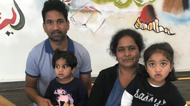 family portrait of Sri Lankan Tamils Priya and Nadesalingam and their two Australian-born children  Kopika and Tharunicaa (L) Nadesalingam.