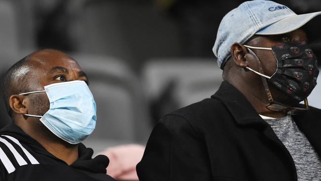 Two D.C. United soccer fans wear masks at a game in Washington, DC. Picture: Patrick McDermott/Getty Images