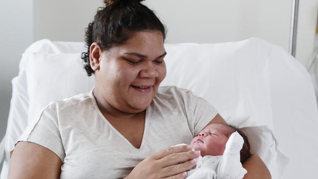 Tamila Hunting was the first baby born at the Cairns Hospital in 2022, arriving into the world at 1:13am on New Year's Day. Tamekka Hunting, 21, of Manunda, cradles her newborn daughter Tamila Hunting in the Cairns Hospital maternity ward. Tamila was born 3.3kg and 48cm long after a 16-hour labour. Picture: Brendan Radke