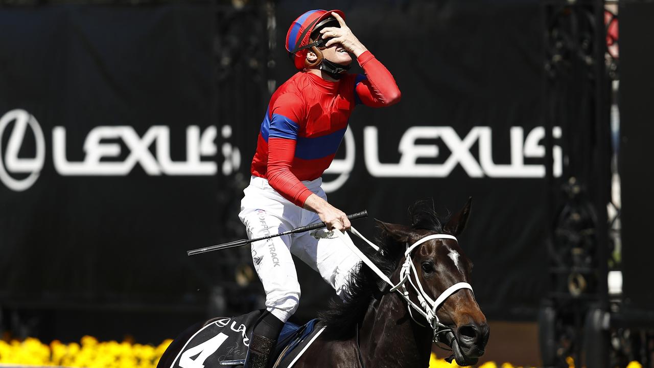 James Mcdonald riding #4 Verry Elleegant celebrates winning race 7, the Lexus Melbourne Cup. Picture: Darrian Traynor/Getty Images